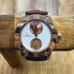 Часы Corum