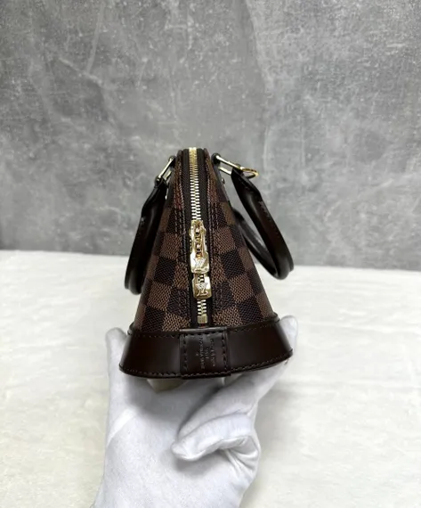 Сумка Louis Vuitton Alma темно-коричневый