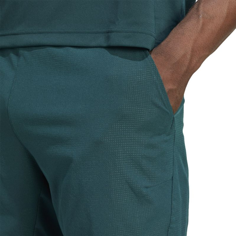 Теннисные шорты Adidas Ergo 9" M - aurora ivy