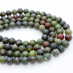 Эпидот с гематитом бусины ("Кровь дракона"), диаметр около 6,3-6,5 мм, цена за 29-30 шт (1/2 нити)