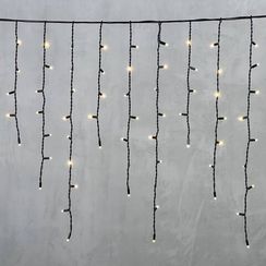 Светодиодная бахрома с колпачком 3,2*0,9 м., 168 теплых белых LED ламп, каучуковый черный провод, LTC (LL168-1-2WW)