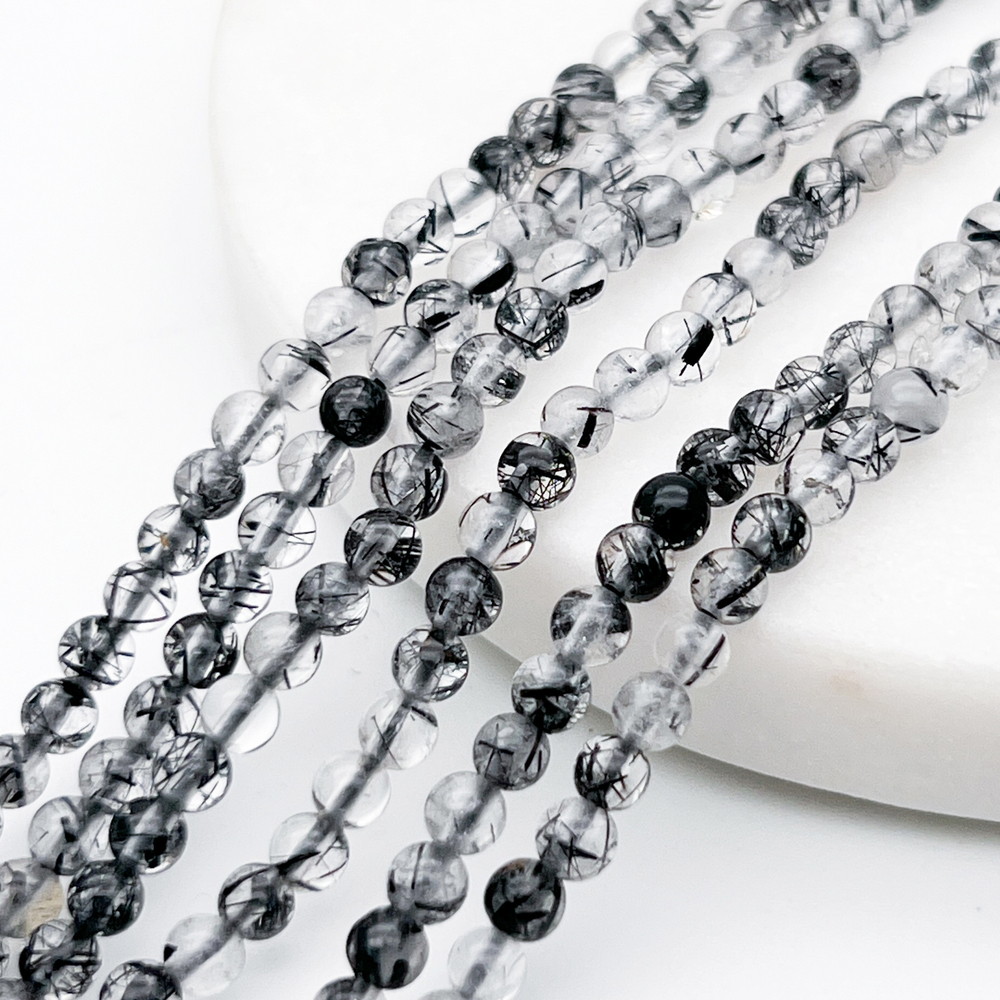 Кварц с шерлом бусины, диаметр около 3,9 мм, цена за отрезок 19 см (1/2 нити)