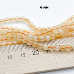 "Цитрин" (кварц), диаметр около 4,5 мм, цена за 42-43 шт (1/2 нити)