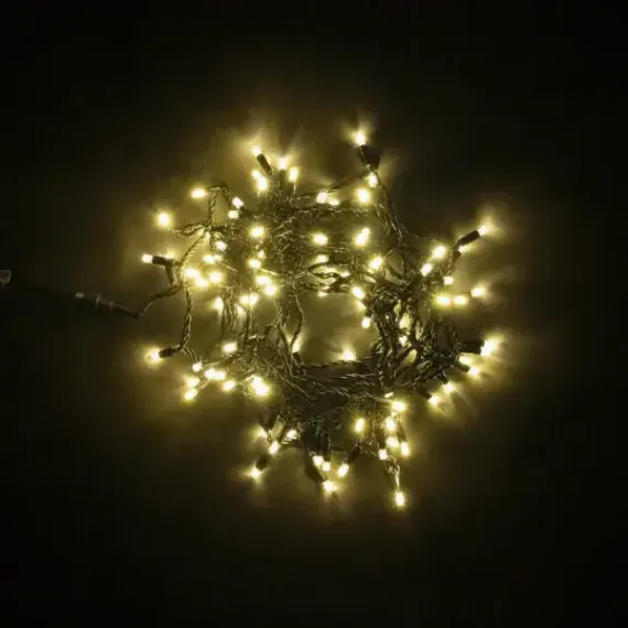 Светодиодная гирлянда с колпачком 100 теплых белых LED ламп 10 м., 24В., черный провод ПВХ, IP65, LTC (PST100CAP-11-1WW)