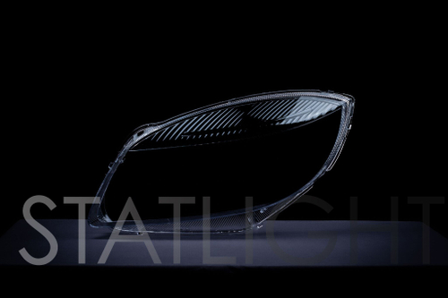 Левое стекло фары Skoda Fabia II 2007-2010