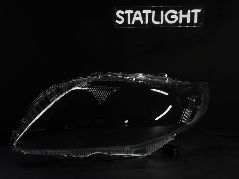 Левое стекло фары Toyota Corolla 150 2007-2010