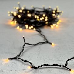 Светодиодная нить 100 экстра теплых белых LED ламп, 10 м., 24В, черный провод ПВХ, LTC (PST100-11-1EWW)