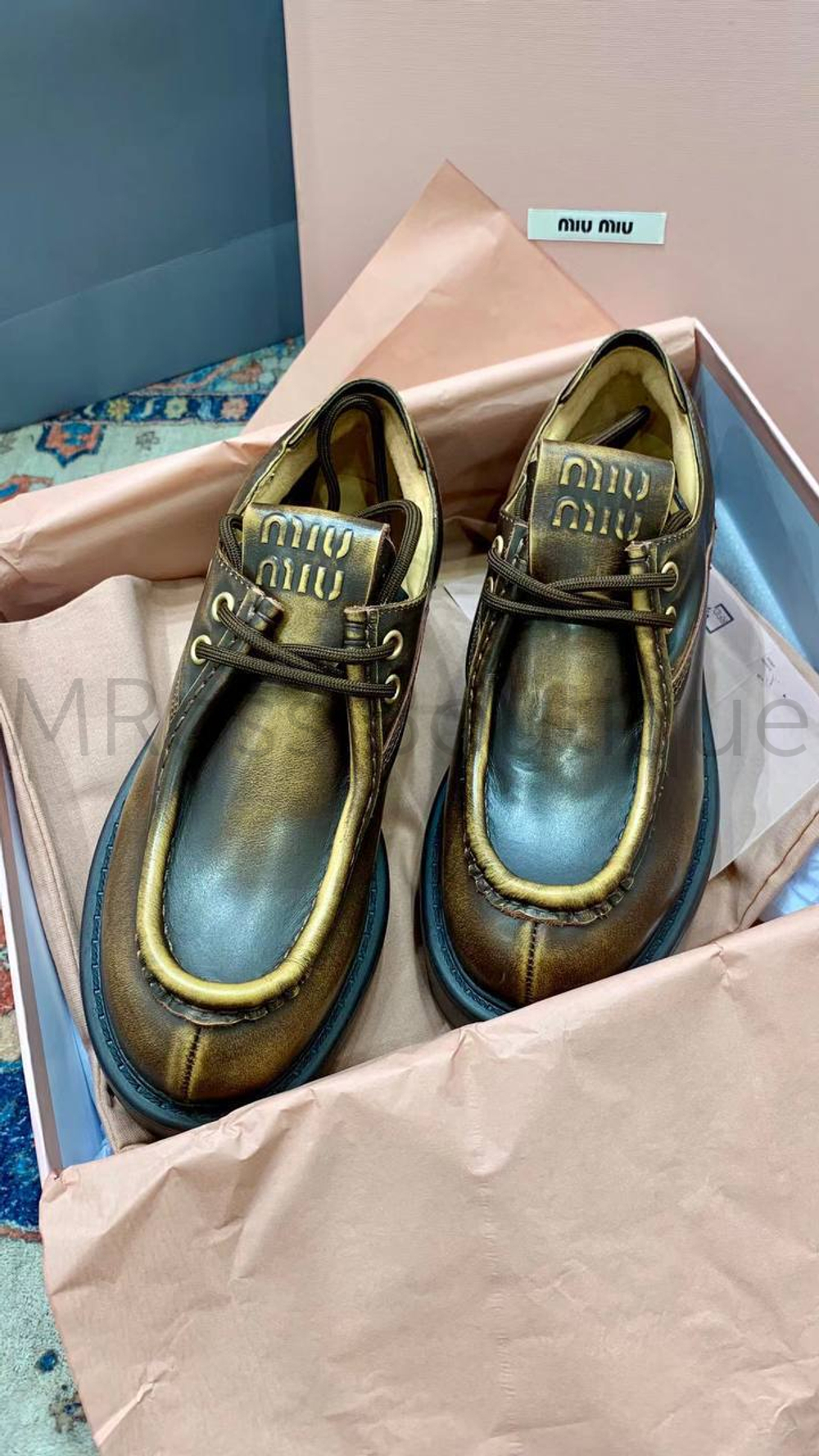 Женские лоферы Miu Miu из кожи в коричневом цвете