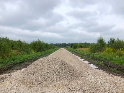 В «Романовском Парке – 2» завершается отсыпка дорог щебнем средней фракции