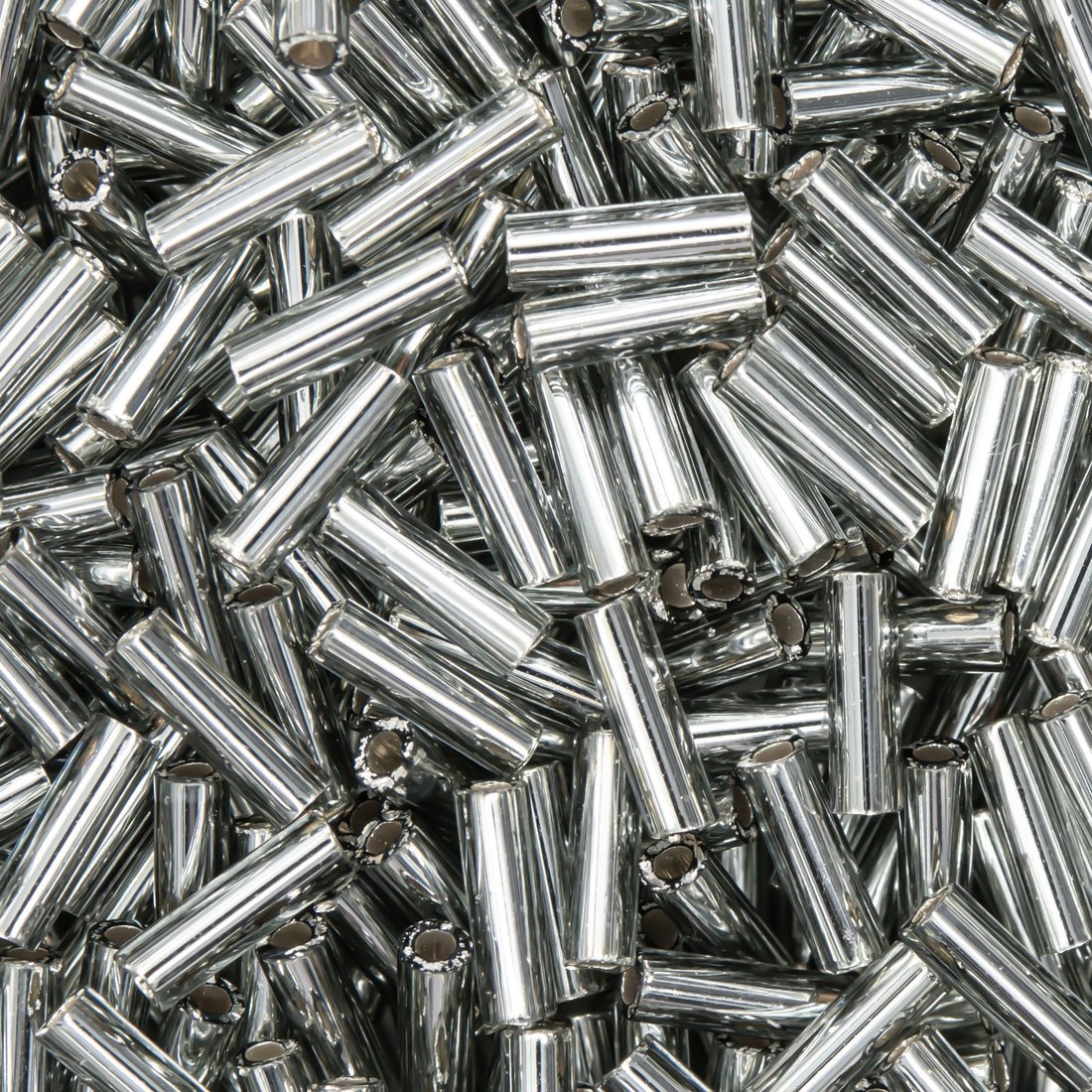 Японский бисер TOHO Bugle (стеклярус) 6mm (№29), с внутренним серебрением, прозрачный