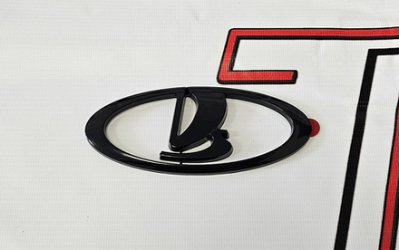 Эмблема решетки радиатора