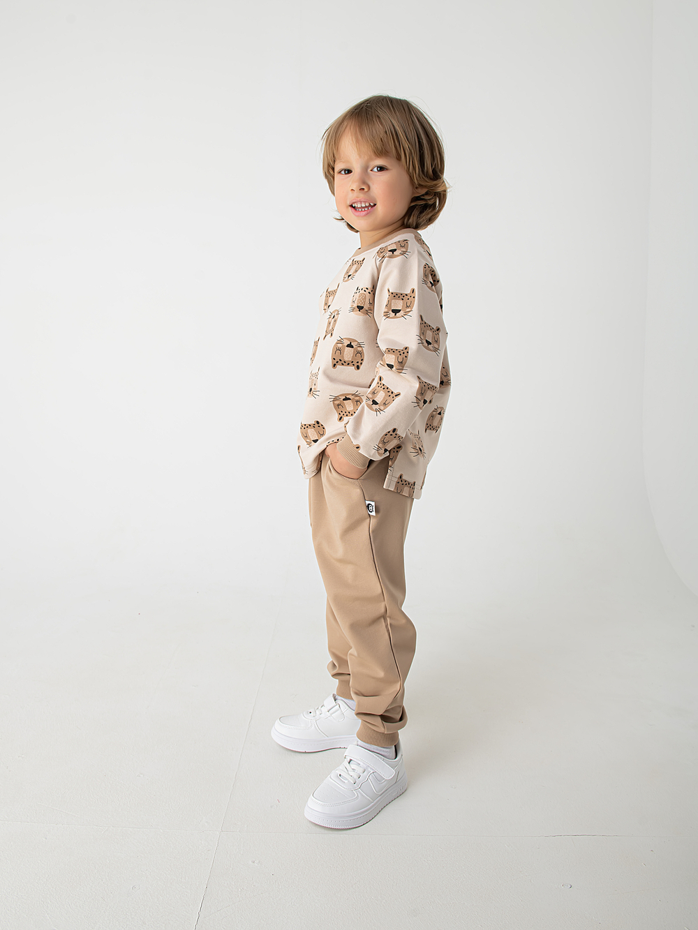 Костюм из трикотажа "Леопарды" бежевый