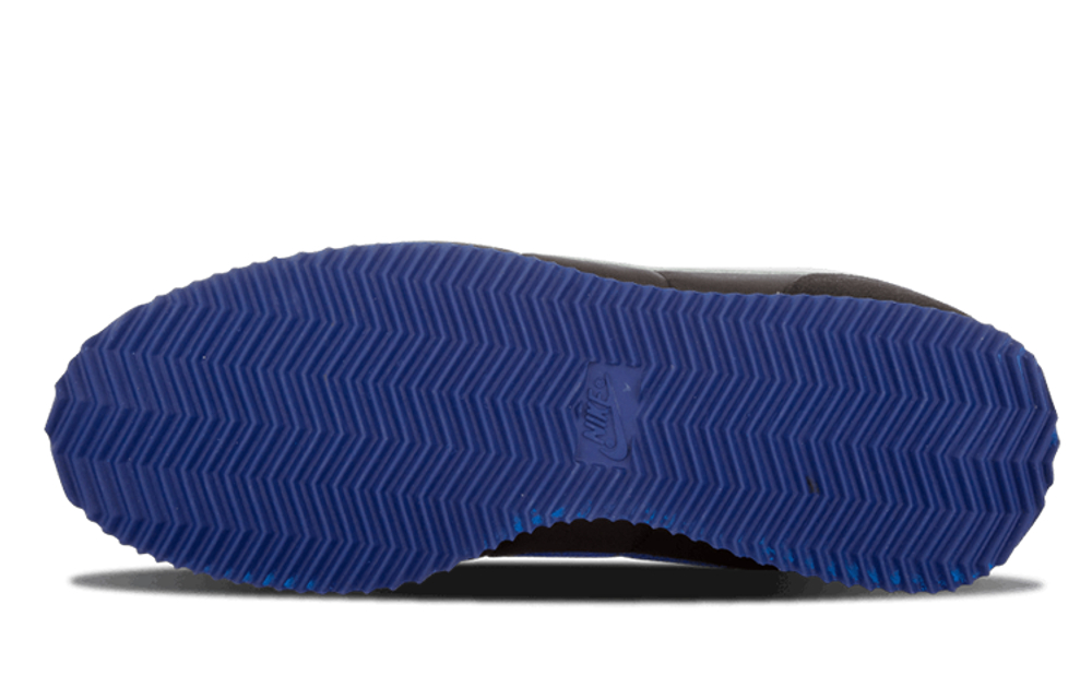 Nike cortez x undefeated outlet