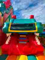 Коммерческий надувной батут «Змей Горыныч» с механизированной головой 14*8*7 м