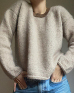 Описание по вязанию блузки спицами "Breezy"