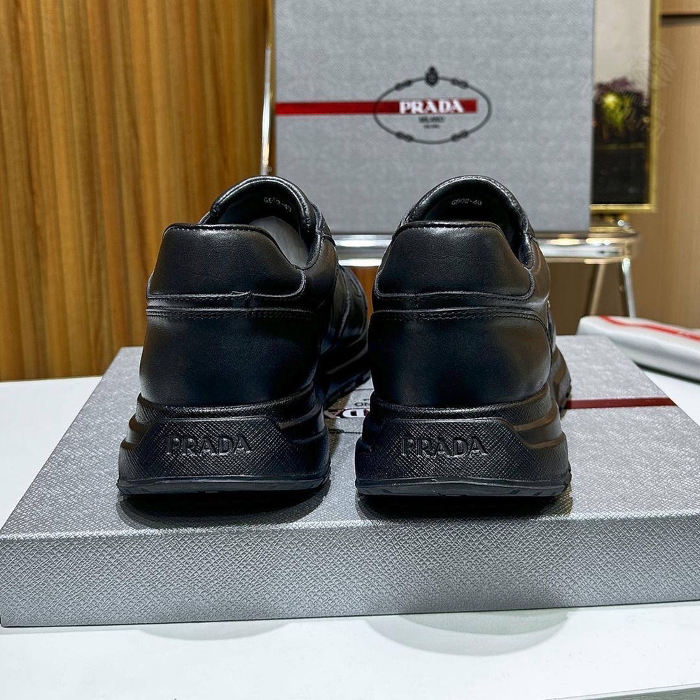 Кроссовки Prada