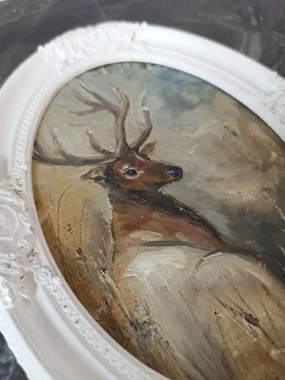 Картина в овальной рамке