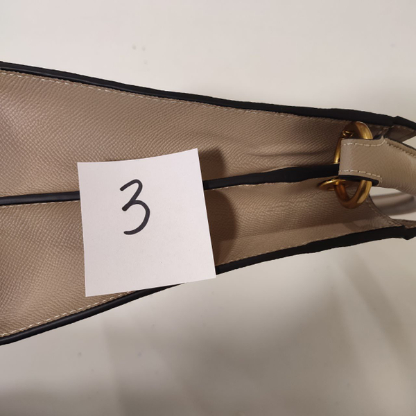 DORRIE mini жемчужная №3 - дефект кожи с торца сумки