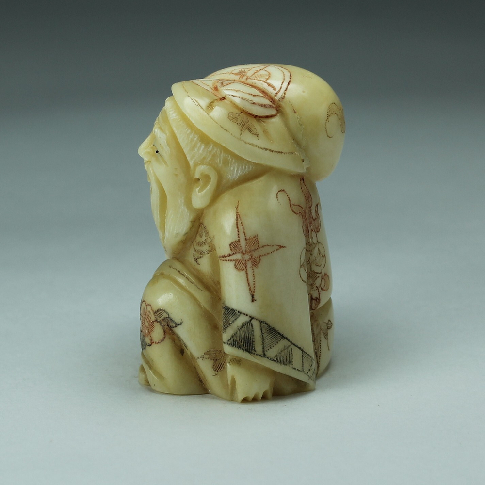 Нэцкэ Фукурокудзю с тыквой горлянкой и корзиной рыбы