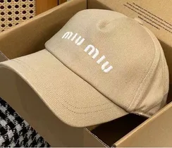 Бейсболка MIU MIU бежевый
