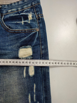 Джинсы с рваным эффектом 44 размер