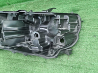 Корпус фары левый Toyota Land Cruiser 200 (15-21)