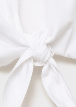 Укороченный топ с бантом на спине