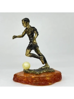 Бронзовая статуэтка на янтаре