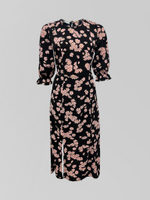 Платье в ромашку с завязками сзади