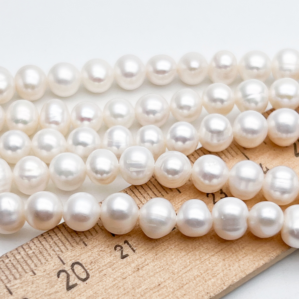 Жемчуг бусины, размер около 6-7,2*5,8-7 мм, цена за отрезок 19 см (1/2 нити)