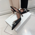 Amina Muaddi Pumps