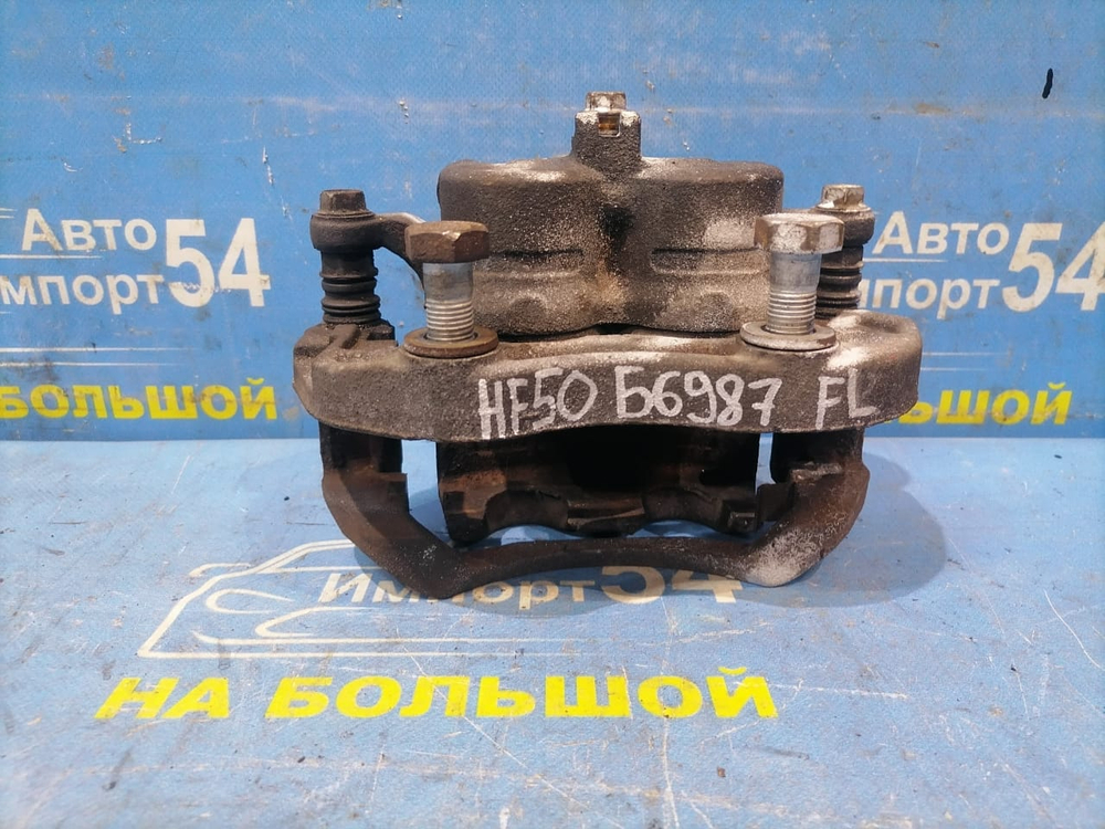 Суппорт тормозной передний левый NISSAN CIMA 2001-2010