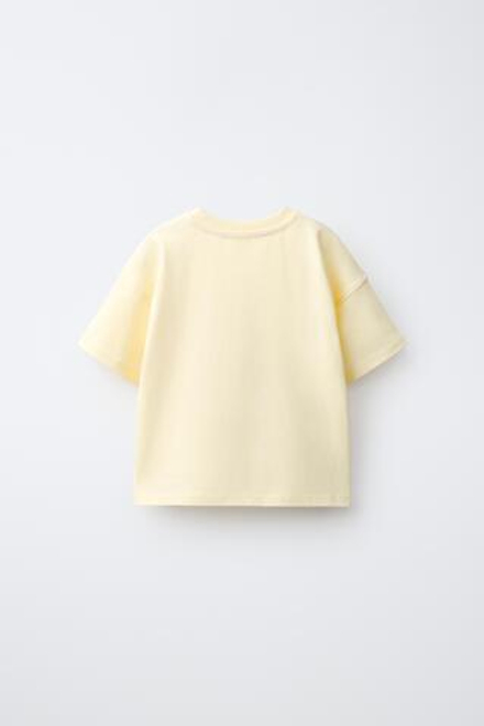 ZARA ФУТБОЛКА С ПРИНТОМ, ПАСТЕЛЬНО-ЖЕЛТЫЙ