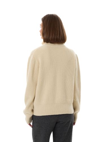 Бежевый кардиган в рубчик на пуговицах