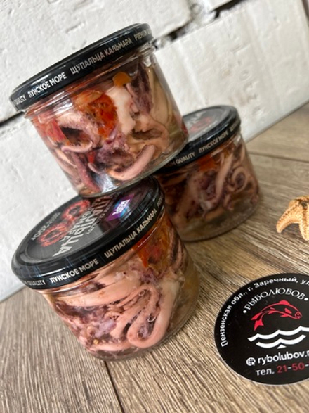 Щупальца кальмара с копченой паприкой в масле