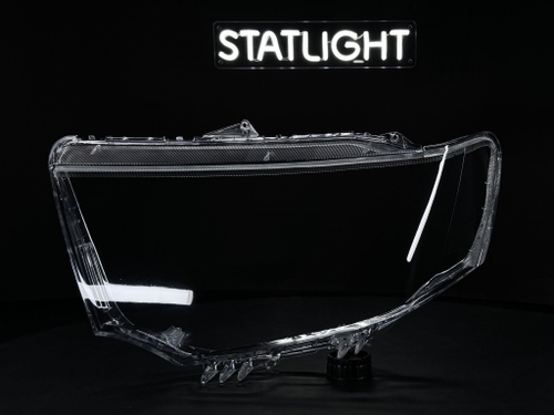 Левое стекло фары Mitsubishi Pajero Sport 2008-2016