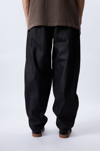 Черные джинсы Gorpgort с накладными карманами спереди