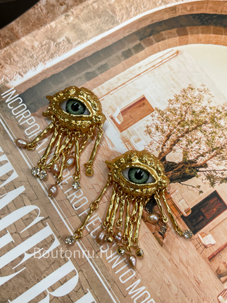 Брошь Скиапар. золотистая в форме глаза с подвесками