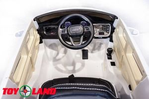 Детский электромобиль Toyland Audi Q7 высокая дверь белый
