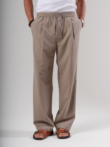 Бежевые брюки Laine