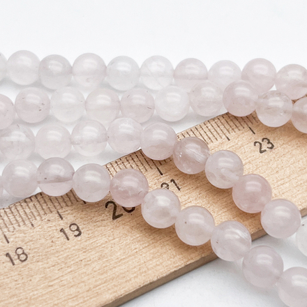 Розовый кварц бусины, диаметр около 6,5-6,8 мм, цена за 14 шт (1/4 нити)