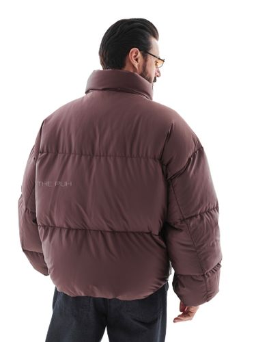 Короткий стеганый пуховик в цвете шоколад