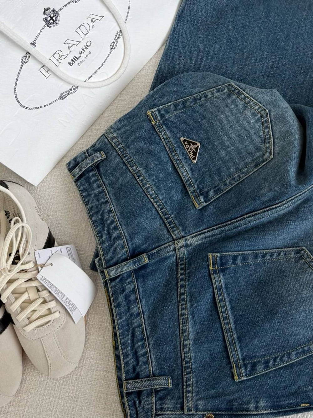 Джинсы Prada