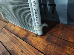 Радиатор кондиционера Solaris 1 / Rio 3 Б/У Оригинал 976061R000