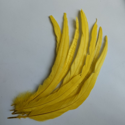 Перья петуха желтые 2 сорт 30 -35 см. за штуку