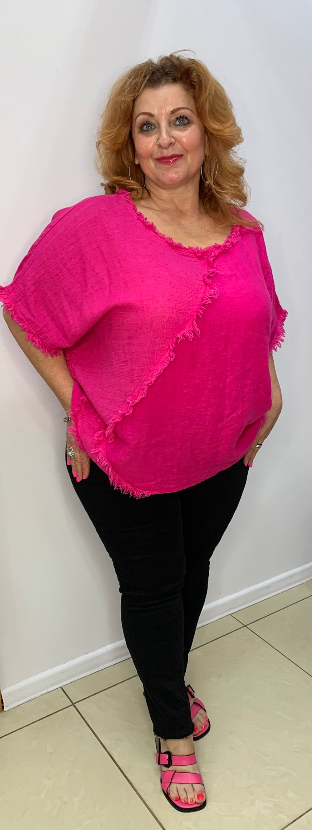 Льняная туника с вывернутыми швами и бахромой