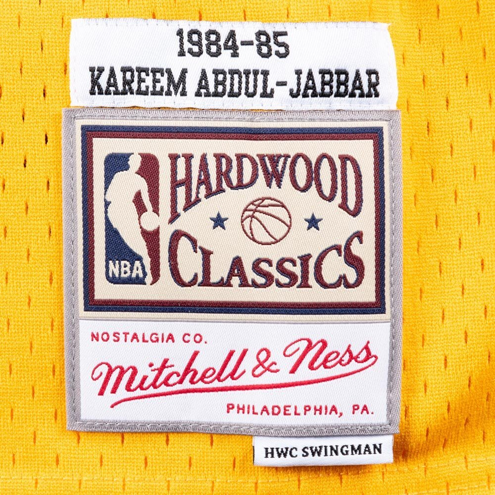 Баскетбольная джерси Mitchell & Ness NBA Swingman Jerseys Los Angeles Lakers - Kareem Abdul-Jabbar #33 (SMJYAC18110-LALLTGD8)