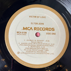 Винтажная виниловая пластинка LP Elton John Victim Of Love (Canada 1979)
