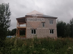 Строительство двухэтажного дома из блоков 210 м2