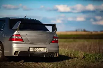 Спойлер var.1 в стиле Evo для Mitsubishi Lancer 9 (высокий)